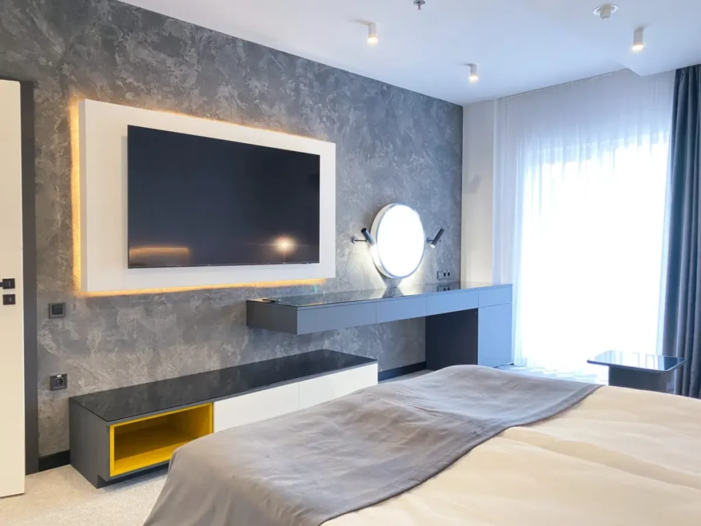 Спальня номера Люкс у санаторії «Rixos-Прикарпаття» в Трускавці