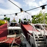 Тераса на даху вілли Хижина SPA у Трускавці з освітленням світловими гірляндами