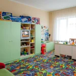 Игровая комната с телевизором и детскими игрушками в санатории Трускавца